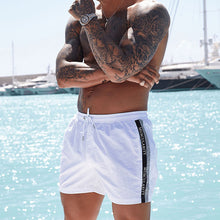 Load image into Gallery viewer, Men's Fashion Casual Sports Beach Solid Color Shorts