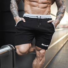 Load image into Gallery viewer, Men's Fashion Casual Sports Beach Solid Color Shorts