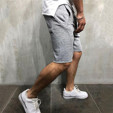 Load image into Gallery viewer, Men's Solid Color Quick-Drying Sports Shorts
