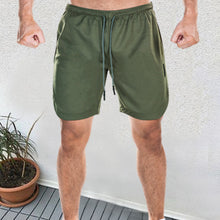 Load image into Gallery viewer, Loose Multi-Pocket Double Layer Men's Shorts  
